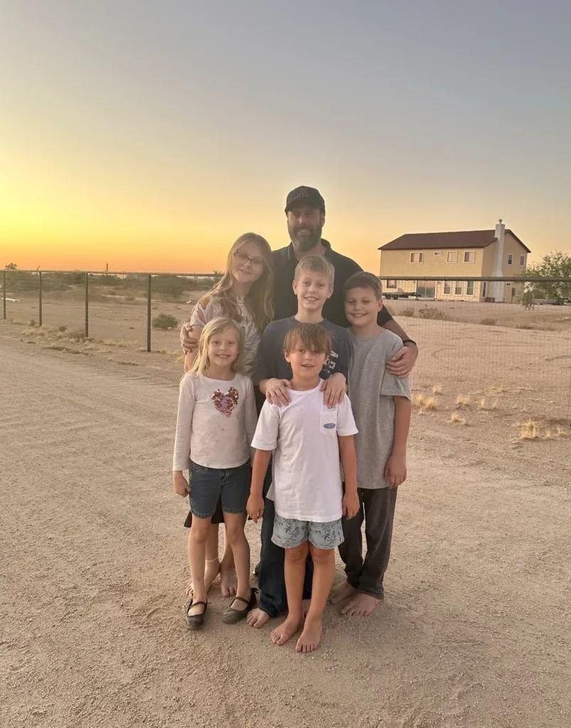 Rickert family in front of a home