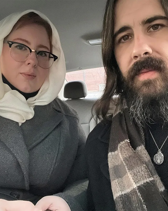 Dymphna and Maxim in a car